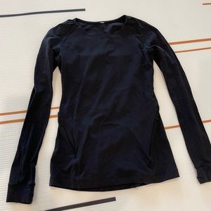 Lululemon, Cute long sleeve with zippered pockets. Thicker material, size 8. GUC
